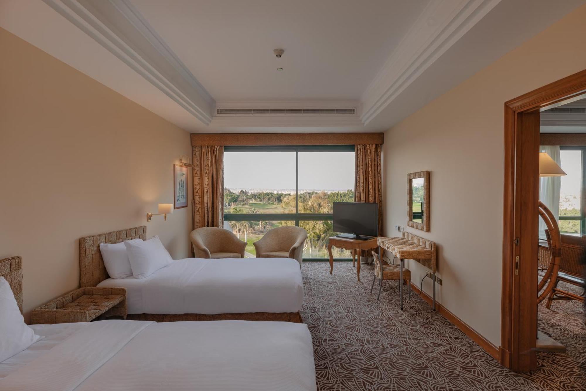 Hilton Pyramids Golf Hotel 6th of October City Exterior photo Deluxe Room